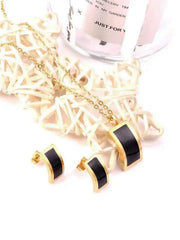 Curved geometric necklace and earring set
